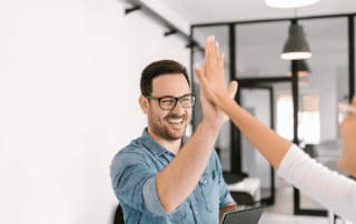 How to build a strategic partnership with your Executive. People high-fiving